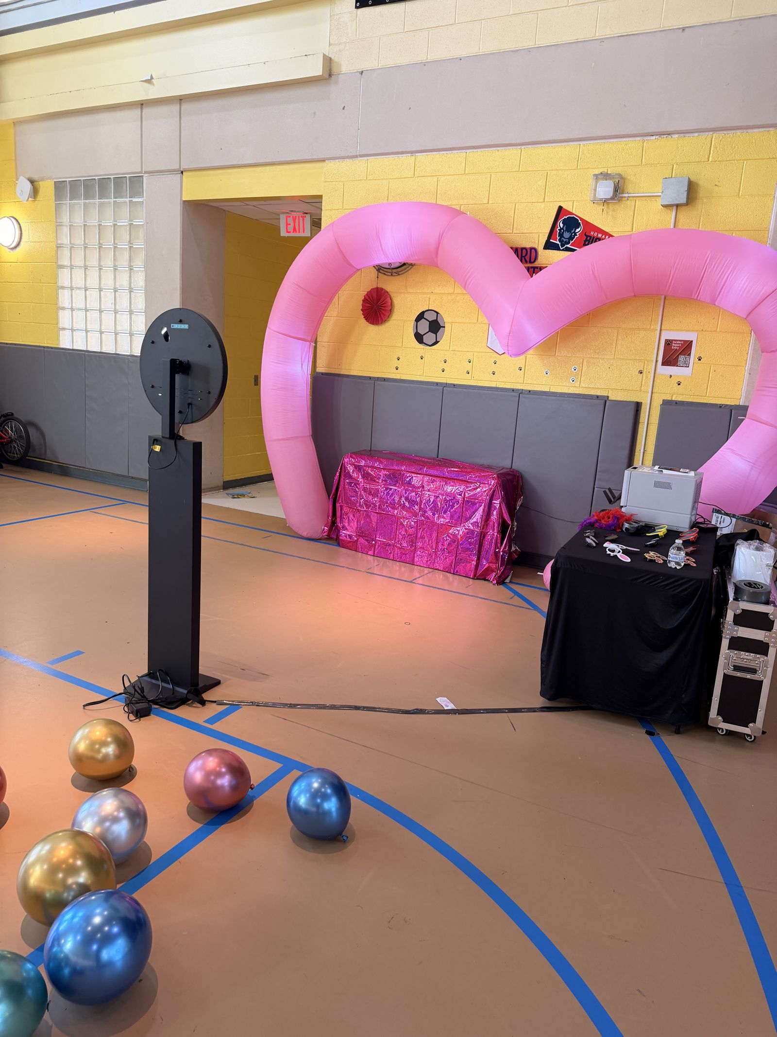 Standard Tower photo booth at an elementary school friendship event with colorful balloons