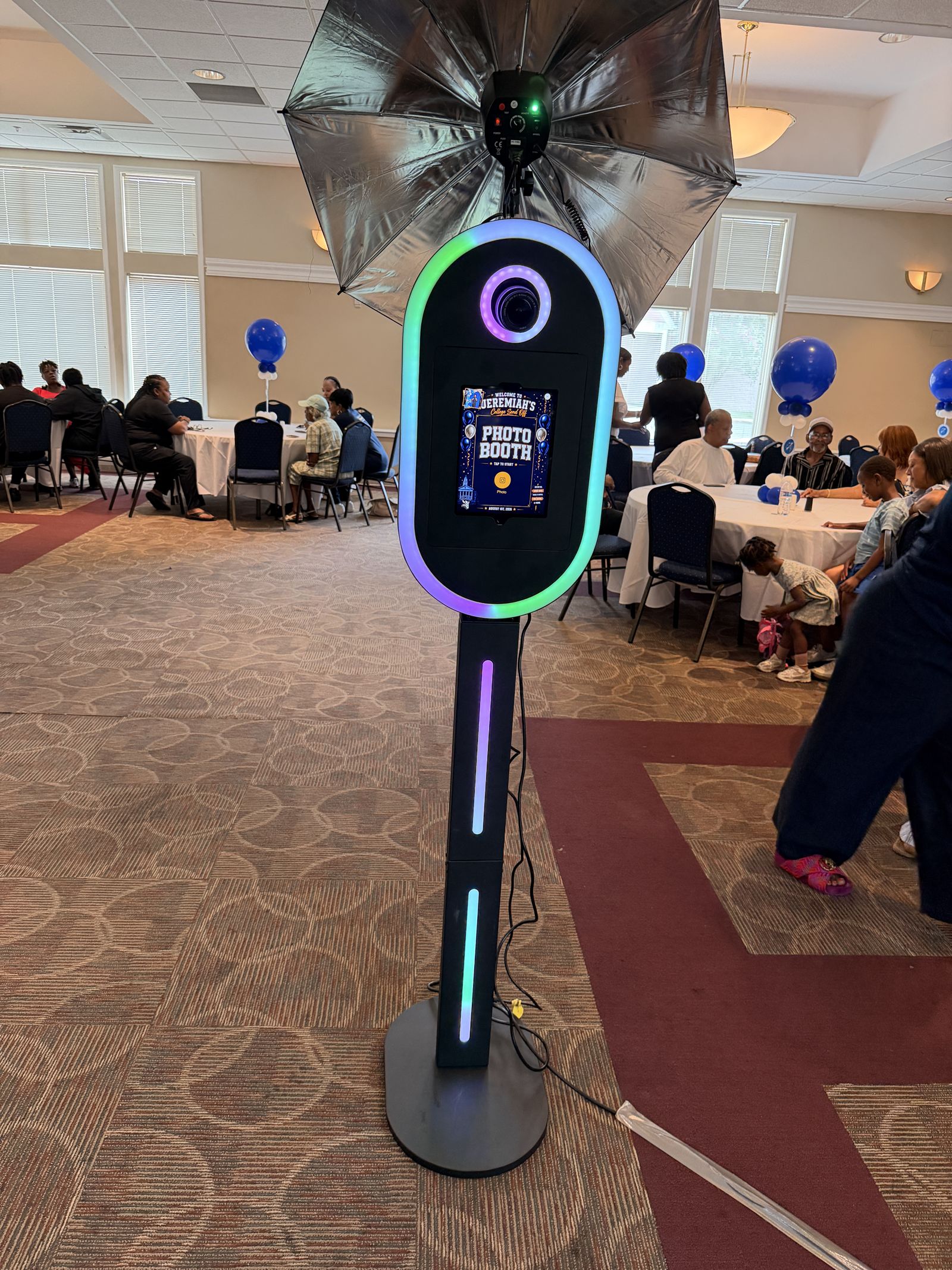 Tower photo booth in action at a college send-off celebration
